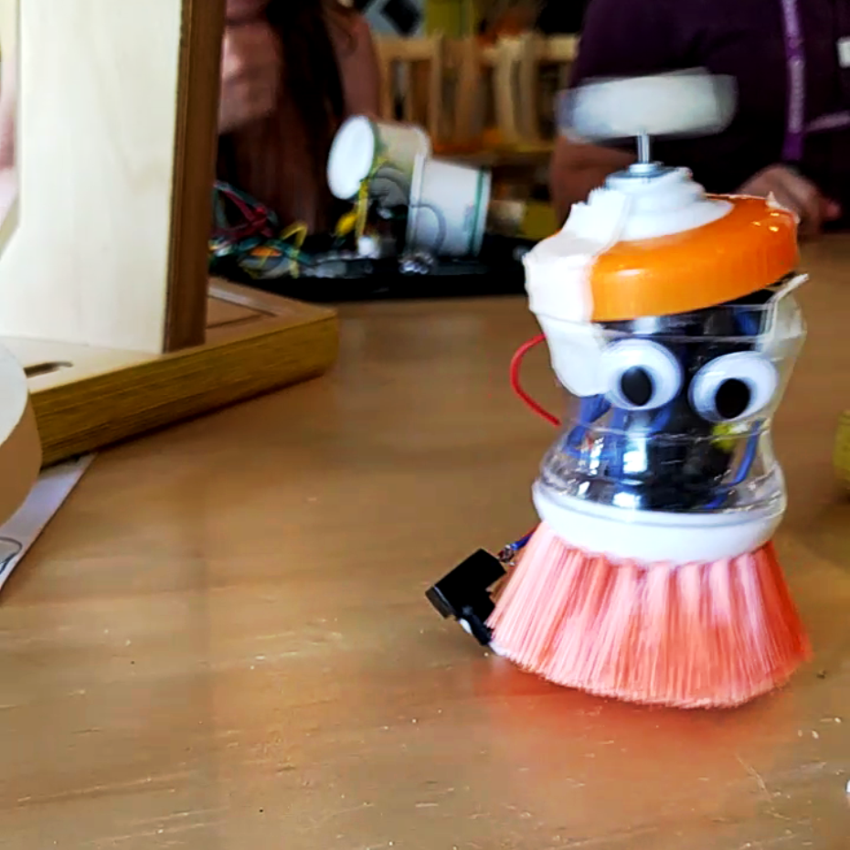 Good Vibrations A scrubbing brush with googly eyes and motor moves across a table