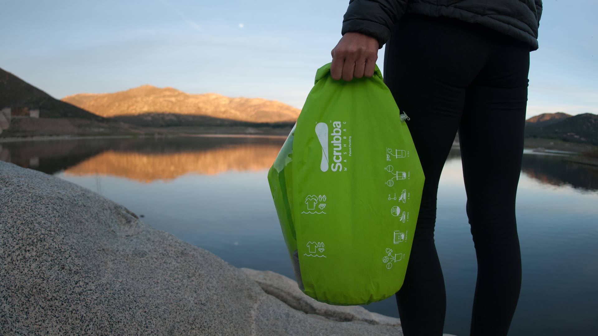 Scrubba Wash Bag Questacon The National Science And Technology A Traveller Holds Scrubba Wash Bag In The Wilderness