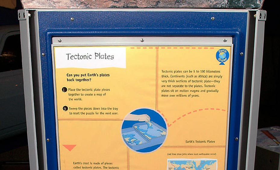 Place the tectonic plate pieces together to create a map of the world. A yellow and blue information panel with the title 'Tectronic Plates'