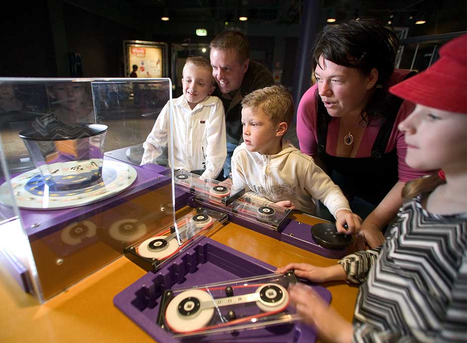 A family look at an a series of spinning mirrors