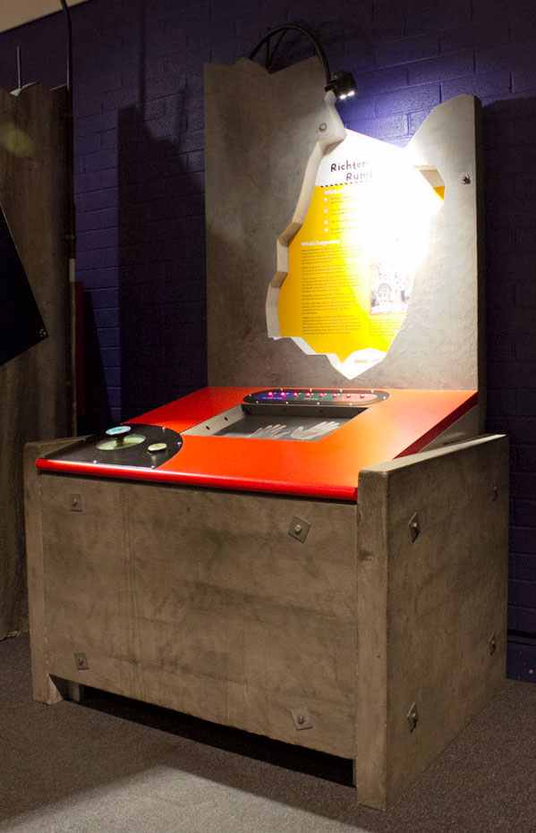 The Richter scale originally used to measure the strength of earthquakes, increases by a factor of 10. The exhibit has an information board placed vertically over a horizontal display control board, with a screen where you place your hands on.