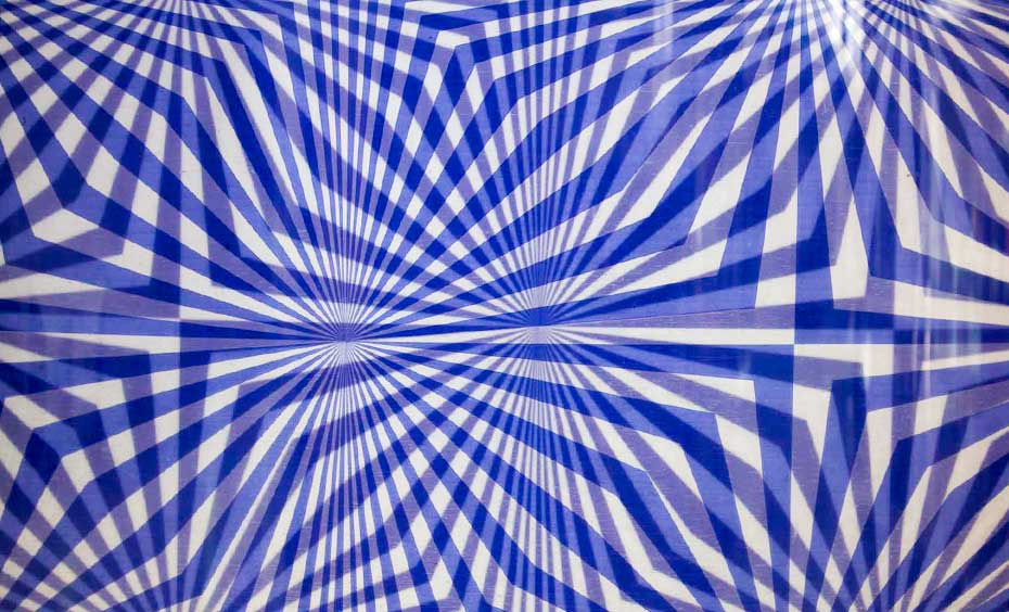 Overlapping line patterns create interference or Moiré pattern illusions. overlapping blue line patterns on a white background.