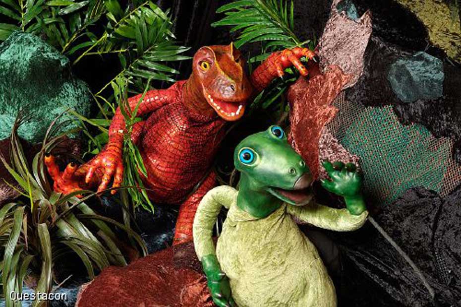 two dinosaur puppets.