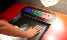 Select an earthquake magnitude on the Richter scale by turning the dial. Press the 'start' button and place your hands on the 'Richter Table'. Feel the earthquake! a display control board, with a screen where you place your hands on.