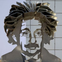 A metal sculpture of Albert Einstein's head and shoulders.