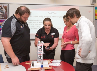 Teacher Workshop presenter explains activity to teachers