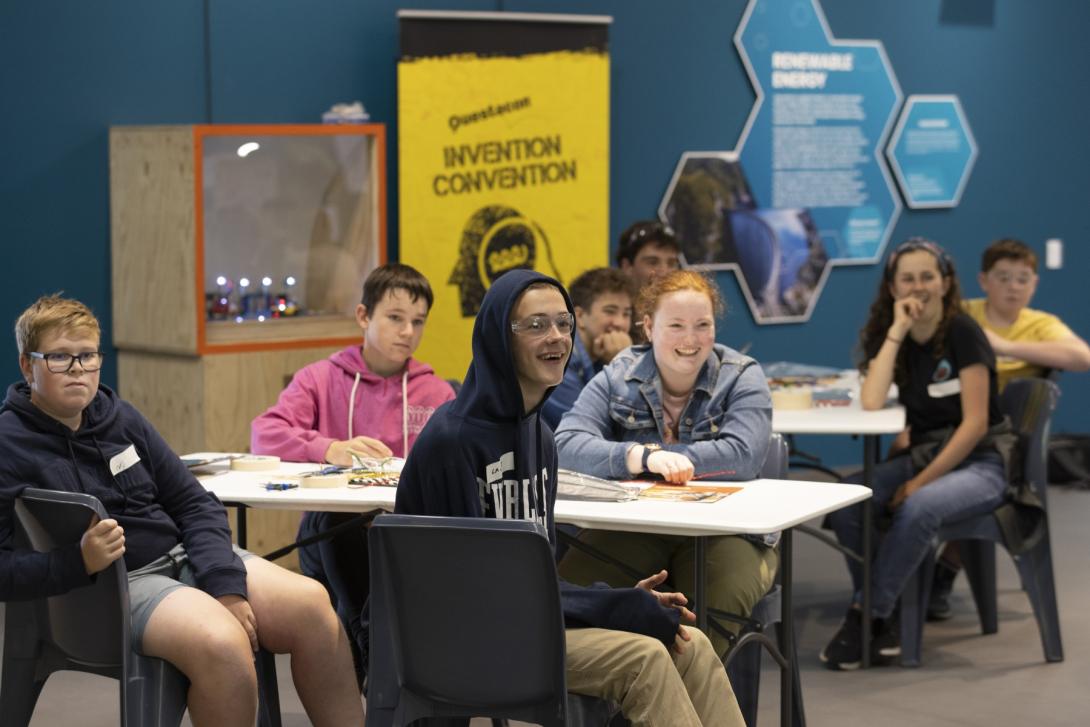 Teenagers attend an Invention Convention workshop